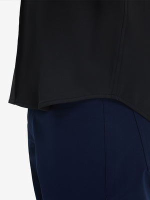 Detail view of hem on black cool print plain button up shirts