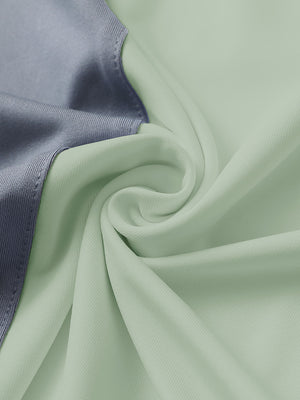 Texture close-up of Moisture wicking color block polo shirts with soft feel and canary green detail