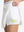 Detail view of inner pocket on white women's moisture-wicking athletic tennis skirts