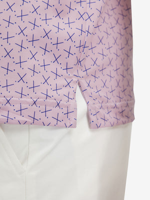 Detail view of hem on pink golf club premium ribbed collar print polo shirts
