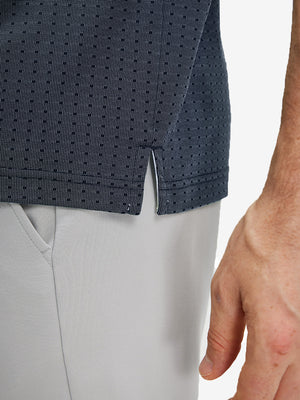 Detail view of hem on dark blue classic lightweight jacquard golf shirts
