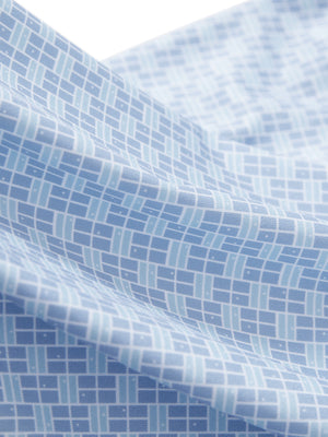 Close-up texture of blue plaid women's sleeveless v-neck print golf shirts fabric showing printed weave detail.