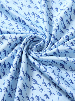 Fabric detail of Stylish print boys polo shirts with soft feel and blue dinosaur pattern