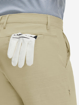 Detail view of back pocket on khaki straight fit lightweight dress golf pants