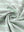 Close-up fabric detail of performance stripe golf shirts, breathable texture with soft olive green beryl green finish