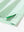 Detail of the side vent hem on the emerald feather weight jacquard polo shirts, showing the split design feature