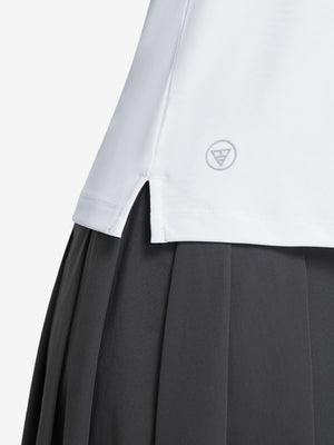 Detail view of hem on white women's collared v neck quick dry tank tops