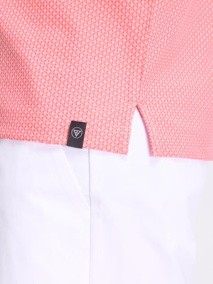 Detail view of cuff on brick red moisture wicking jacquard golf shirts