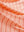 Close-up texture of peach amber/calypso coral non-curl ribbed collar striped polo shirts fabric showing striped weave detail