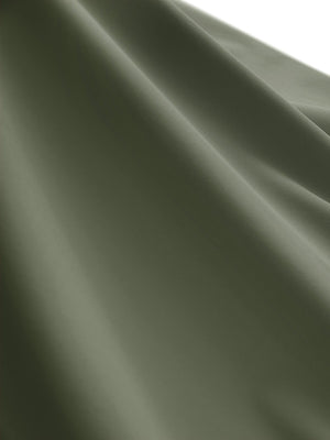 Close-up texture of mossy stone women's moisture-wicking mock neck sleeveless golf tops fabric showing breathable weave detail.