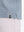 Detail view of cuff on misty blue moisture wicking jacquard golf shirts