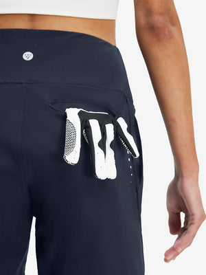 Back side view of pocket on navy women's high waist 2 in 1 quick dry shorts with 7 pockets