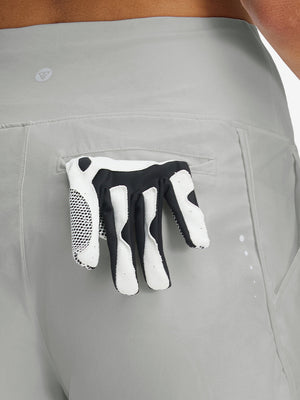 Back side view of pocket on glacier grey women's high waist 2 in 1 quick dry shorts with 7 pockets