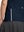 Detail view of hem design on navy women's breathable 1/4 zip pullover golf shirts