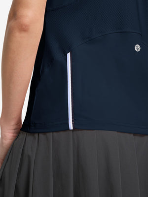 Detail view of hem design on navy women's breathable 1/4 zip pullover golf shirts
