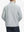 Back half-body view of the model highlighting the Light Grey jacket’s clean silhouette
