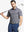Rear half-body view showing fit and jacquard pattern of Ventilated Heather Jacquard Polo – NAVY HEATHER