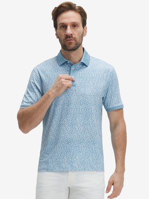 Front upper body shot of model wearing white blue abstract stylish full print contrast collared golf polo shirts