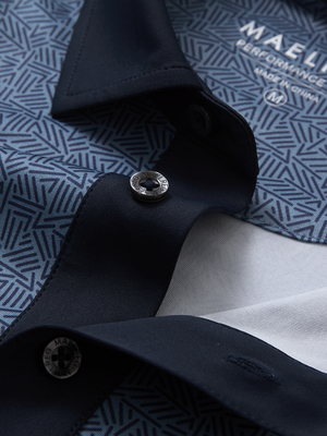 Detail view of collar on navy lines stylish full print contrast collared golf polo shirts