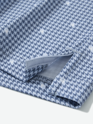 Detail view of hem on light blue houndstooth stylish full print contrast collared golf polo shirts